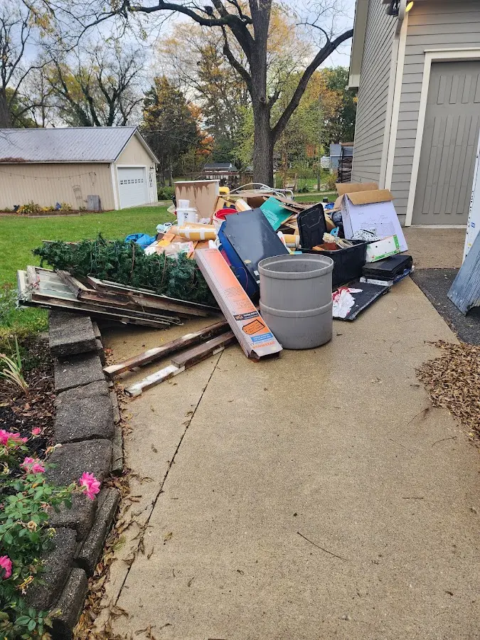 Dumpster being loaded with debris for 30 Yard Dumpster Rental in Coronado